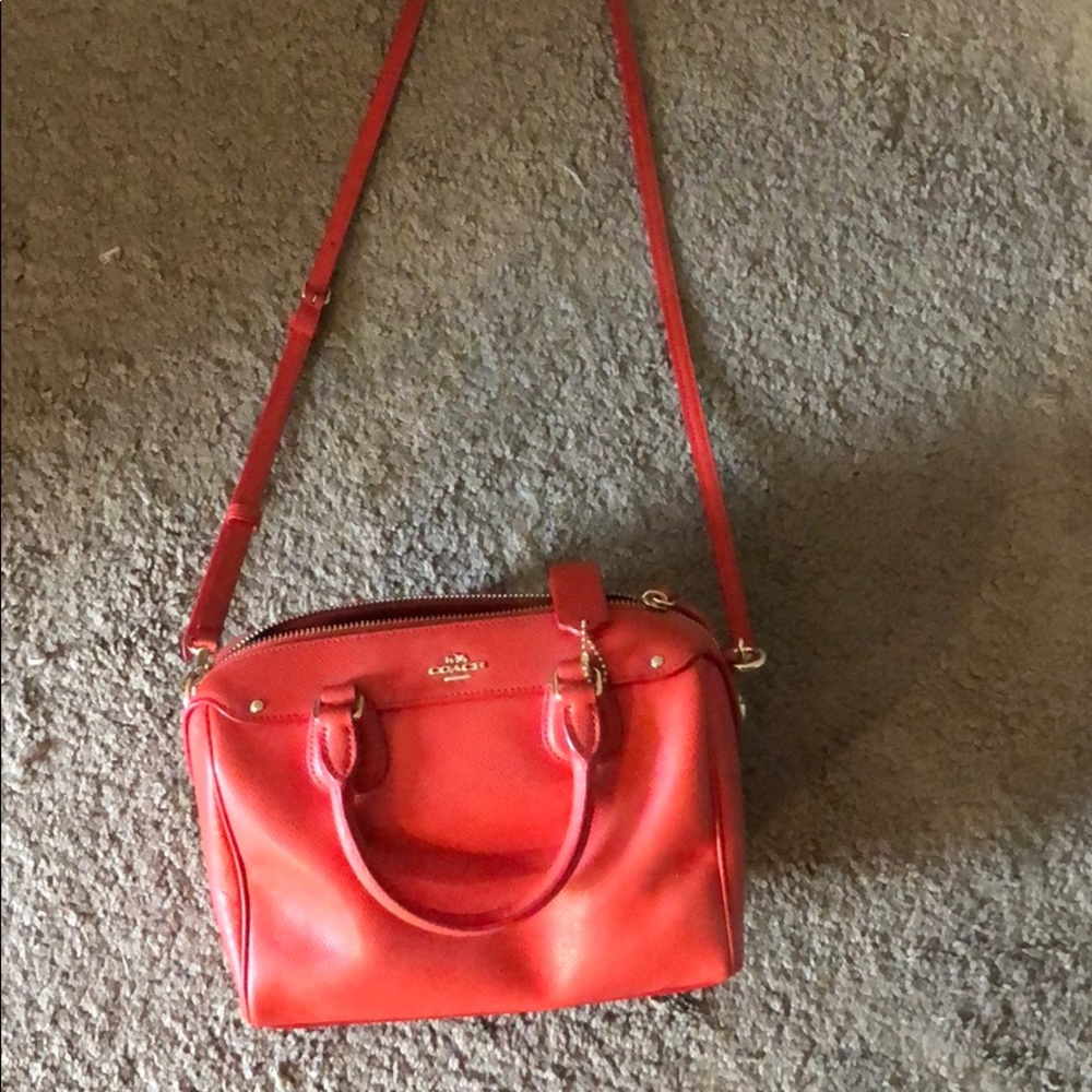 Coral long strapped Coach purse